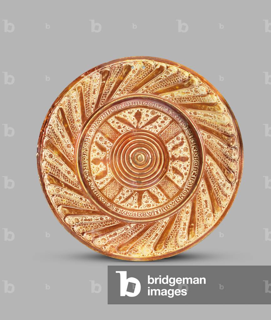 Dish decorated in lustre with raised boss of concentric rings, 1500-25 (tin-glazed lustred ceramic)