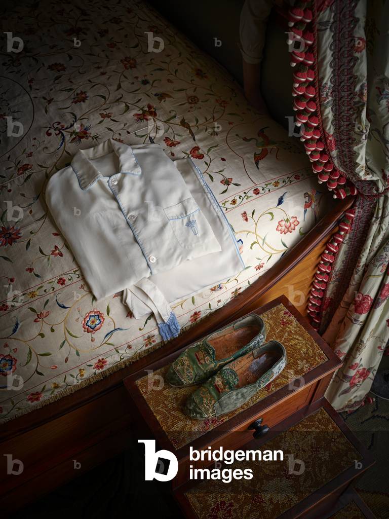The 11th Duke’s silk pyjamas by Turnbull & Asser, alongside his oft-worn and much repaired slippers by John Lobb, Chatsworth House (photo)