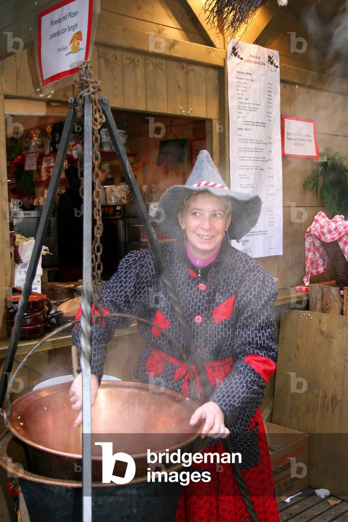 Selling of polenta, Christmas market, Bolzano, Trentino Alto Adige, Italy