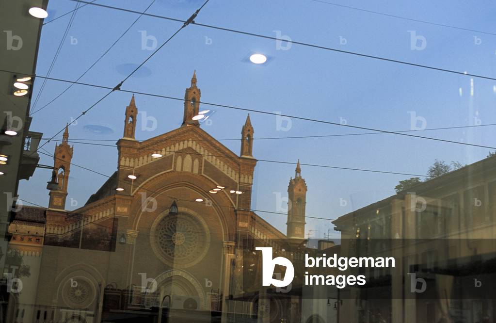 Piazza del Carmine reflects into a window, Milan, Lombardy, Italy