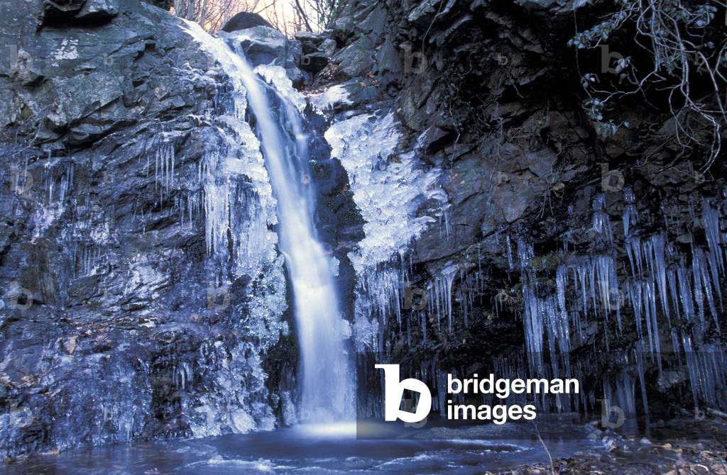 Waterfall and ice, Valsassina, Lombardy, Italy