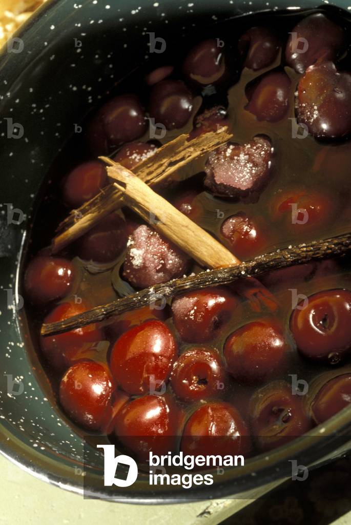 Preparation of cherry jam, Italy