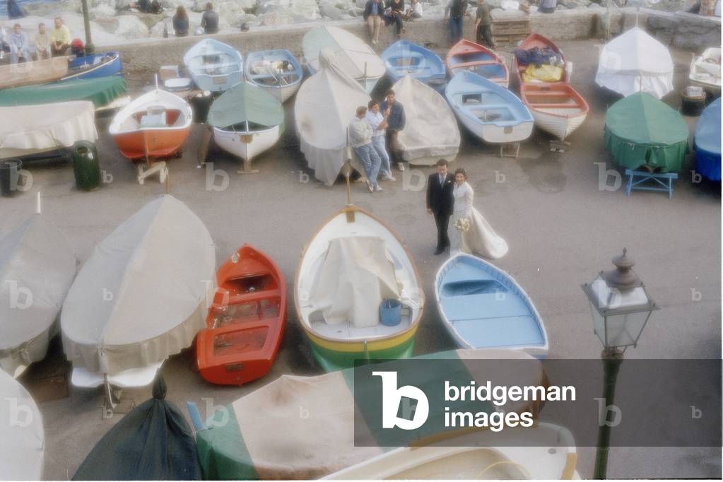 Married couple on the beach, Liguria, Italy