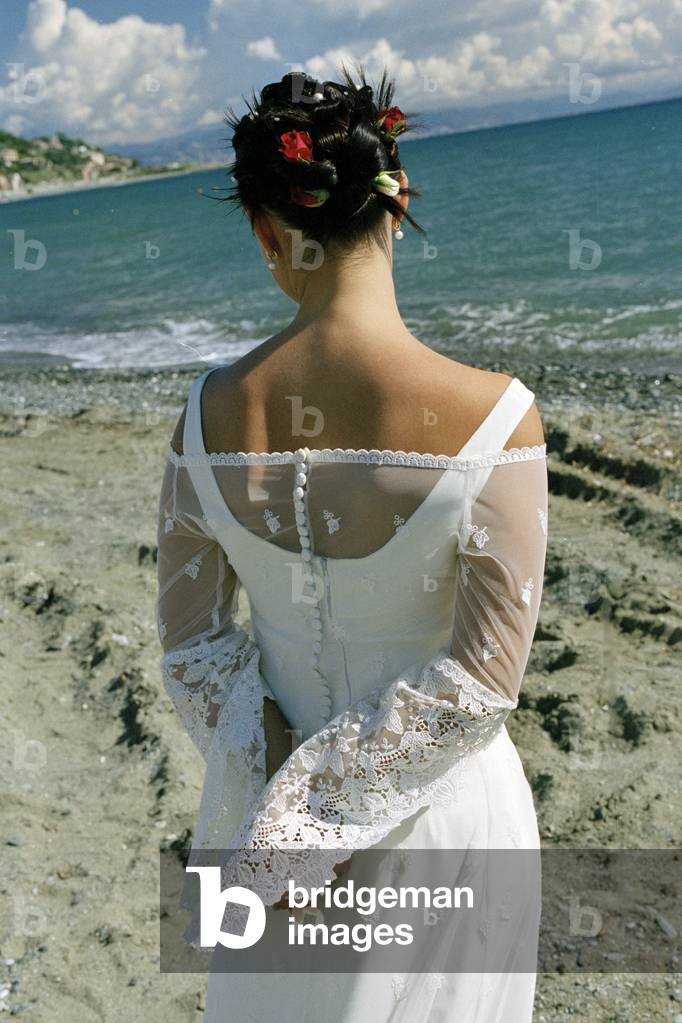 Bride on the beach, Italy
