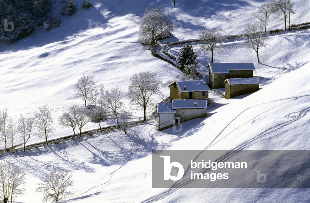 Snow and farmsteads, Piani di Nava, Lombardy, Italy