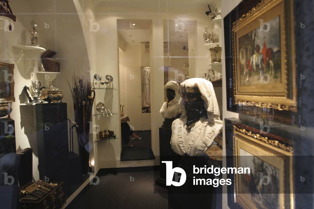 Antiquities, shop window, Milan, Lombardy, Italy