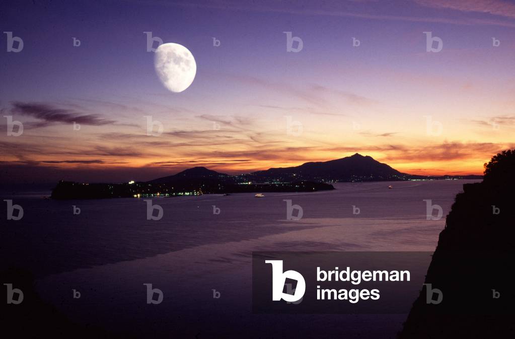 Moon over the islands of Procida and behind Ischia, Campania, Italy