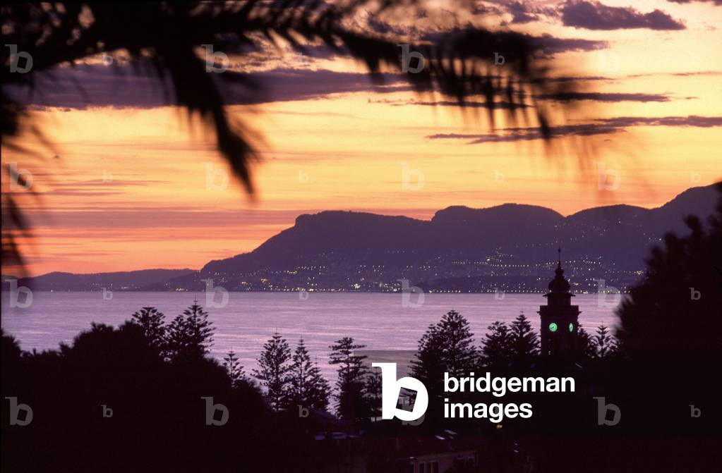 Sunset on bell tower of Terrasanta, Bordighera, Ligury, Italy.
