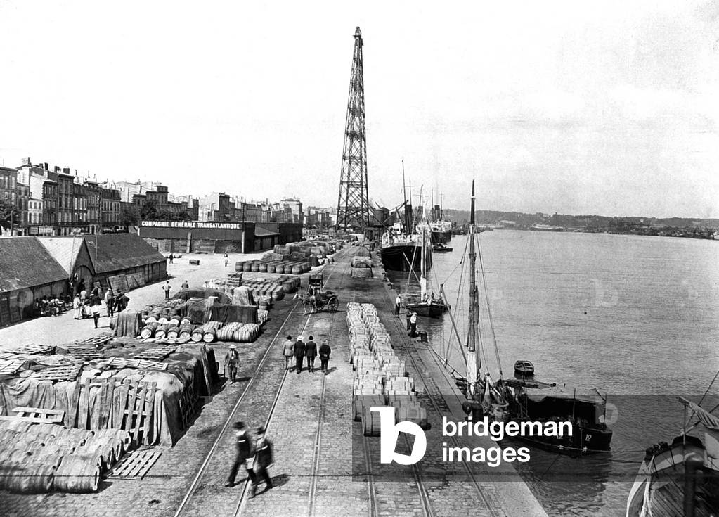 embarkation of barrels bound for foreign countries on the docks in the harbour of Bordeaux south west of France c. 1900