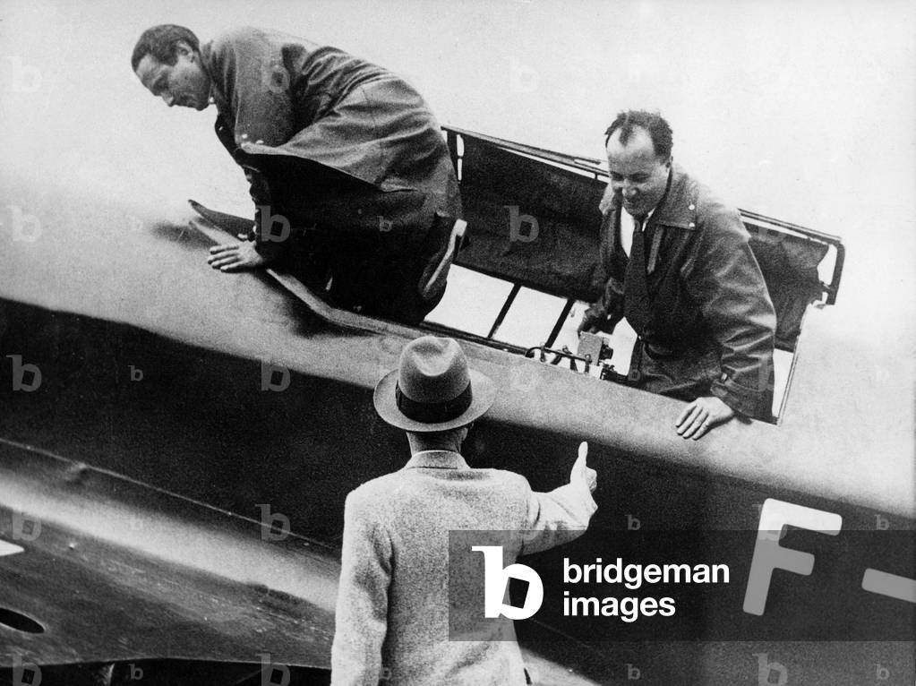 French pilot of Aeropostale Jean Mermoz with Geo Gimie coming back in Bourget after raid Paris-Dakar, august 30, 1935