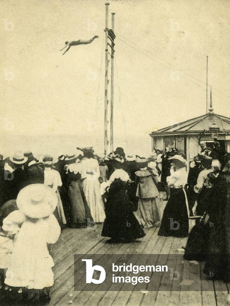 Professor Osbourne diving from SouthPort Pier. 1906 (b/w photo)