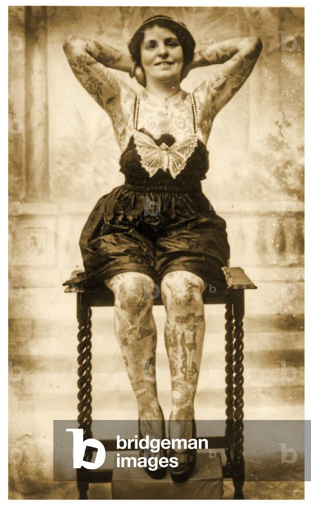 Portrait of a seated tattooed woman, c.1895 (Sepia Photo)