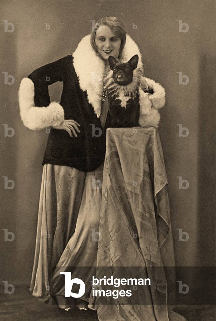 Drag queen Hansi Sturm with her French Bulldog in the Eldorado club, Berlin.c.1927 (photo)