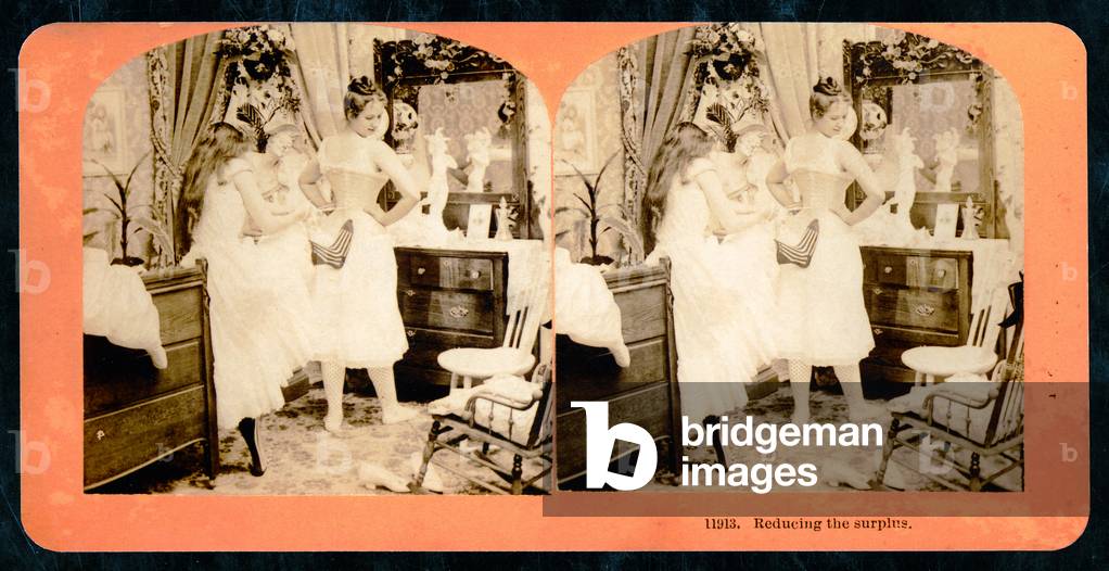 'Reducing the Surplus', stereoscopic card depicting a young woman being laced into a corset, c.1900 (sepia photo) (see also 473248)