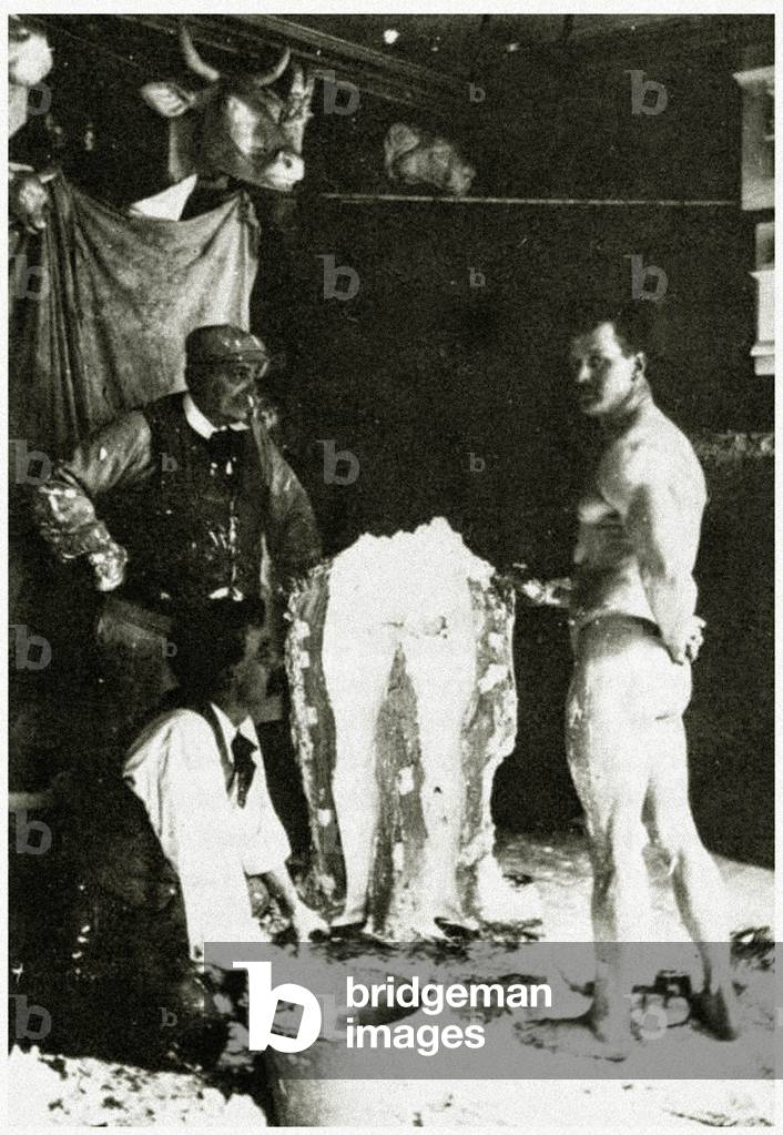 Eugen Sandow having his body cast in sections for the Sandow Statue, Brucciani workshop, 1900 (photo)