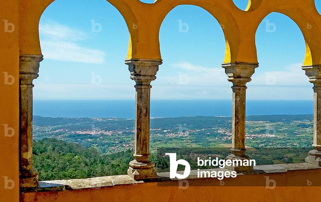 View through the yellow arches of Pena National Palace, Sintra, Portugal (photo)