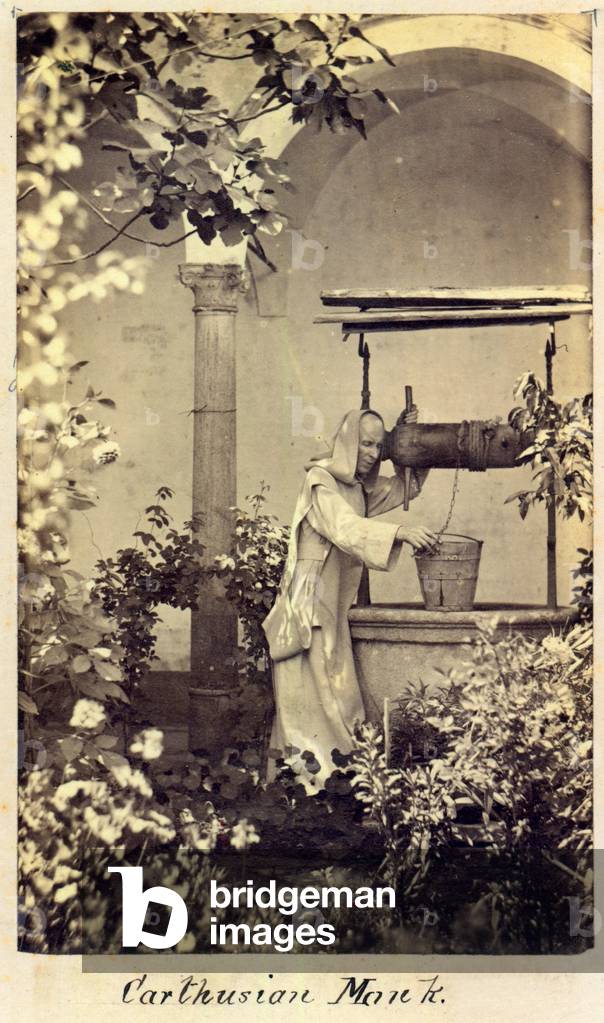 A Carthusian Monk drawing water from a well, c. 1870 (photo)