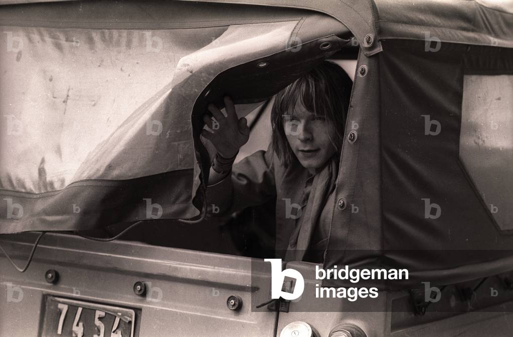 Actor Renaud on set on a movie, 1975 (b/w photo)