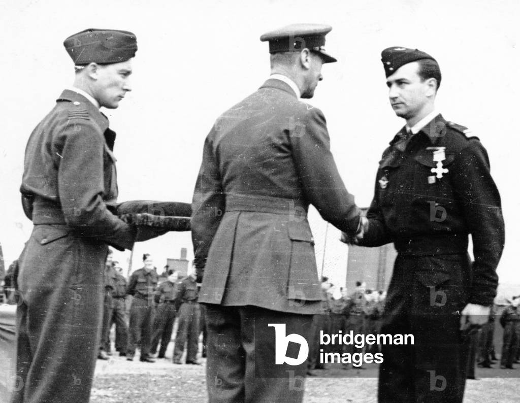 King George VI of England decorating Lieutenant Colonel Gorri, in the presence of Captain MacDonald, Hartfordbridge, England, 14 July 1944 (b/w photo)