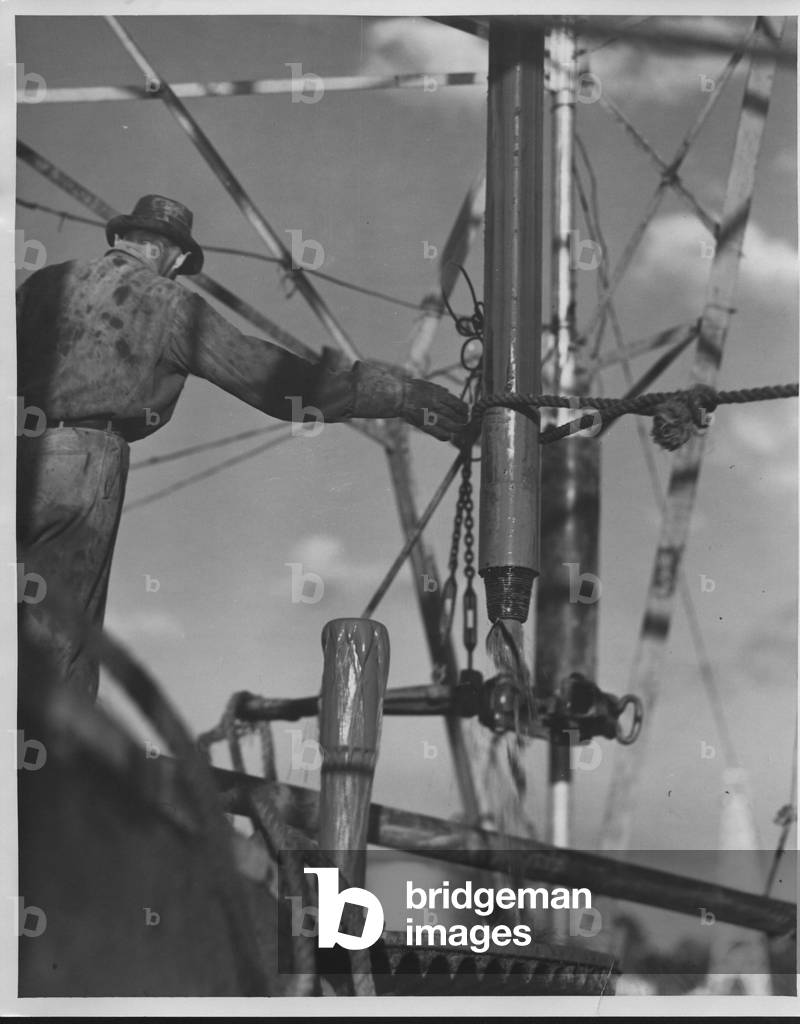 Workman on an Oil Derrick, Texas, 1935-36 (b/w photo)