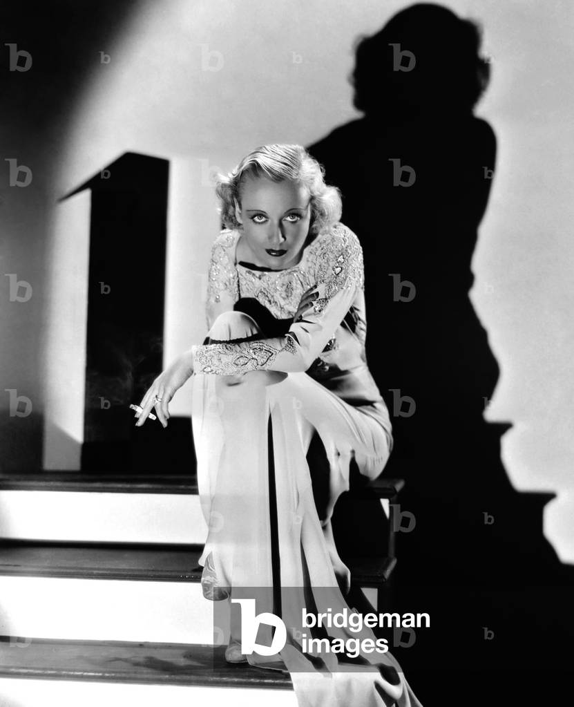 1931: American Film Actress Carole Lombard (1908 - 1942) Casts A Dramatic Shadow Against The Wall Behind Her