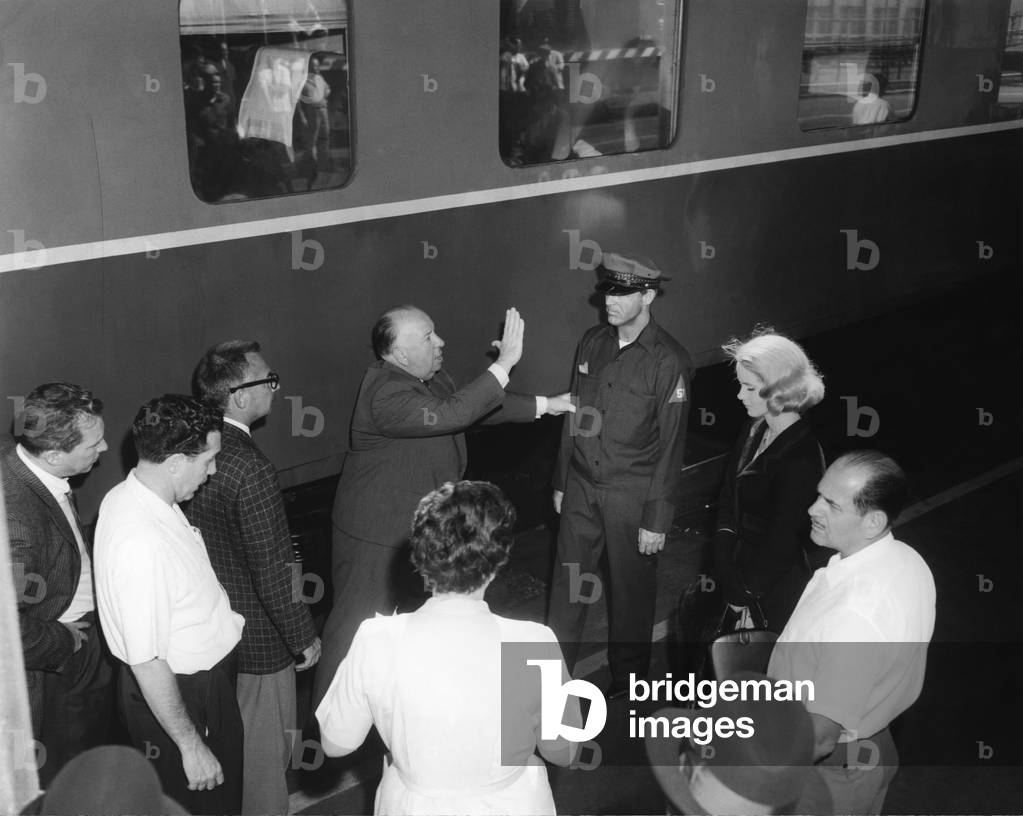 On The Set,Alfred Hitchcock Directs Cary Grant And Eva Marie Saint.