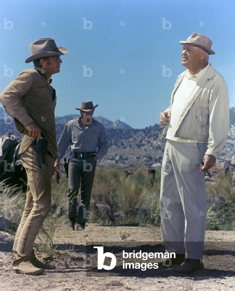 NEVADA SMITH, 1966 directed by HENRY HATHAWAY On the set, Henry Hathaway directs Steve McQueen and Brian Keith (behind) (photo)