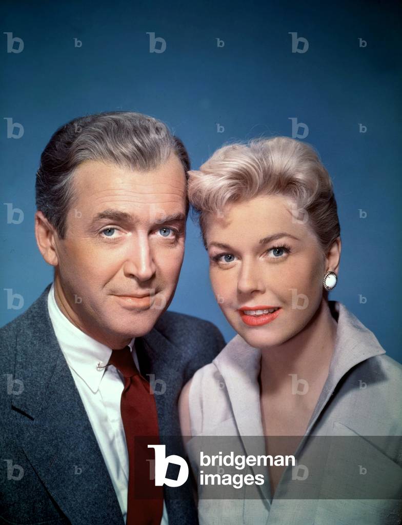 THE MAN WHO KNEW TOO MUCH, 1956 directed by ALFRED HITCHCOCK James Stewart and Doris Day (photo)