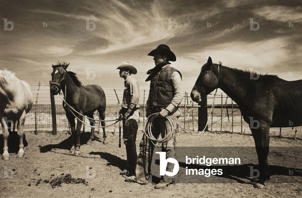 Two Cowboys, Four Sixties Ranch, Guthrie, Texas, 1974 (gelatin silver print with toning)