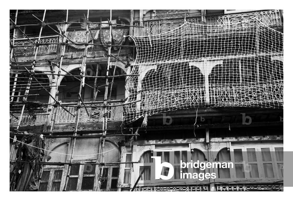 Building renovation at Mahatma Jyotirao Phule, Mumbai, Maharashtra, India (b/w photo)