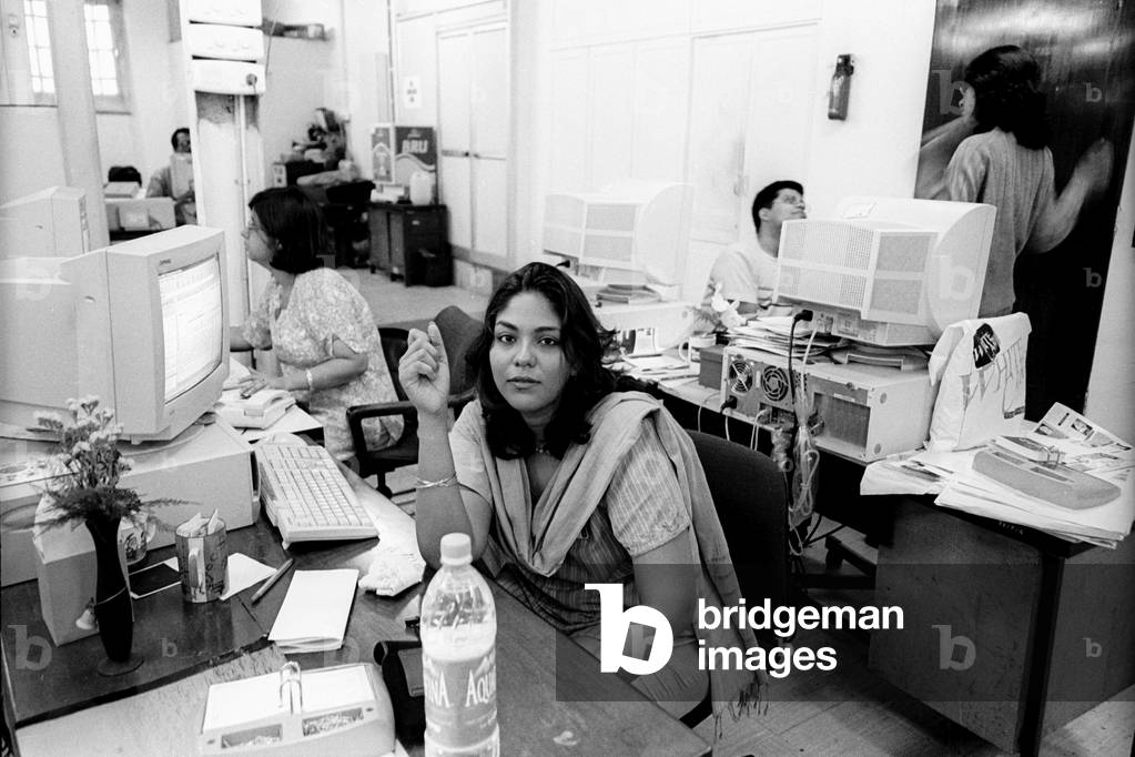 Priya Pathiyan at newspaper office, India (photo)