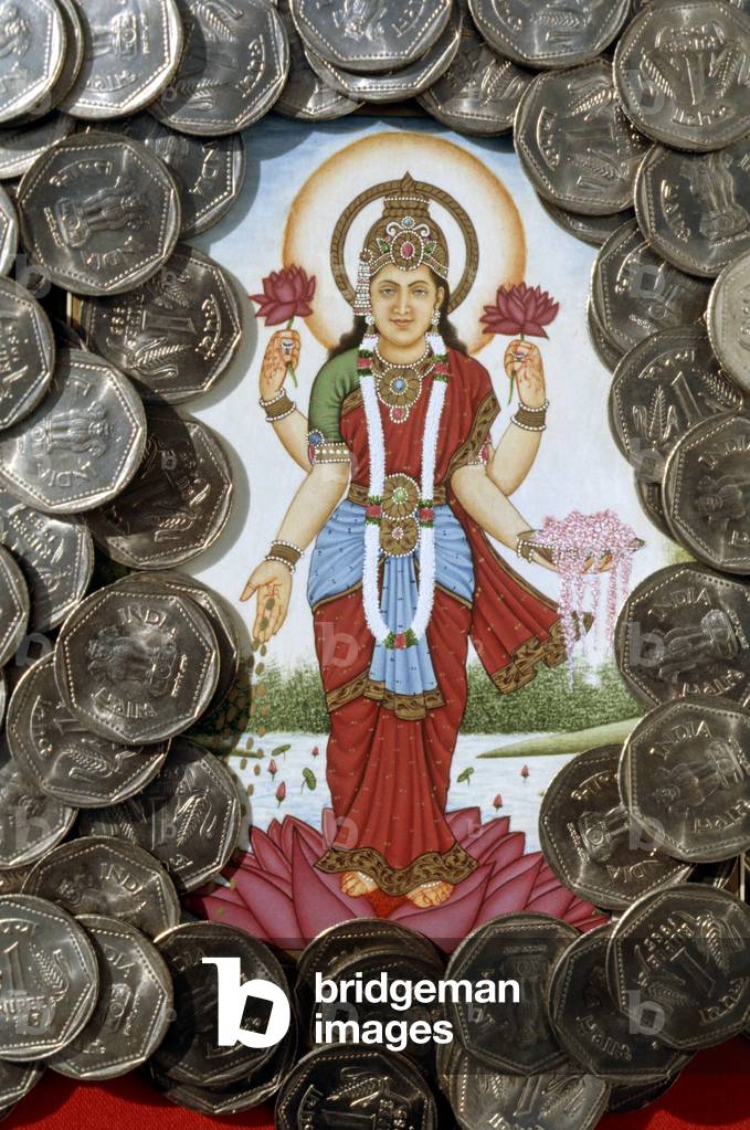 Goddess Lakshmi and One Rupees Coins