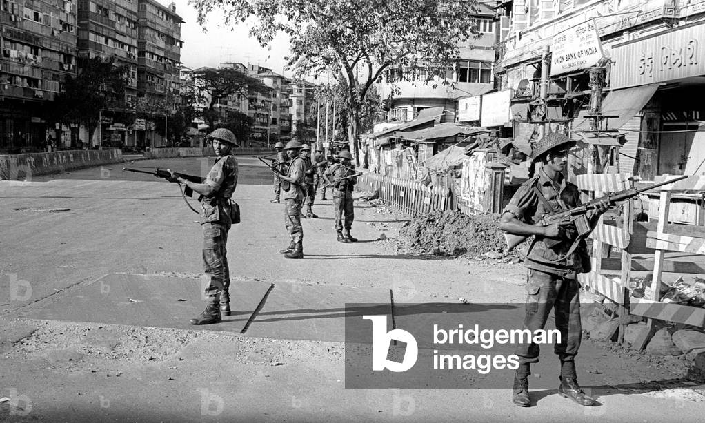 Army personnel were deployed near Mohammed Ali road to prevent rioting after religious fundamentalists demolished the Babri Masjid, Ayodhya, Uttar Pradesh, India, 6th December 1992 (b/w photo)