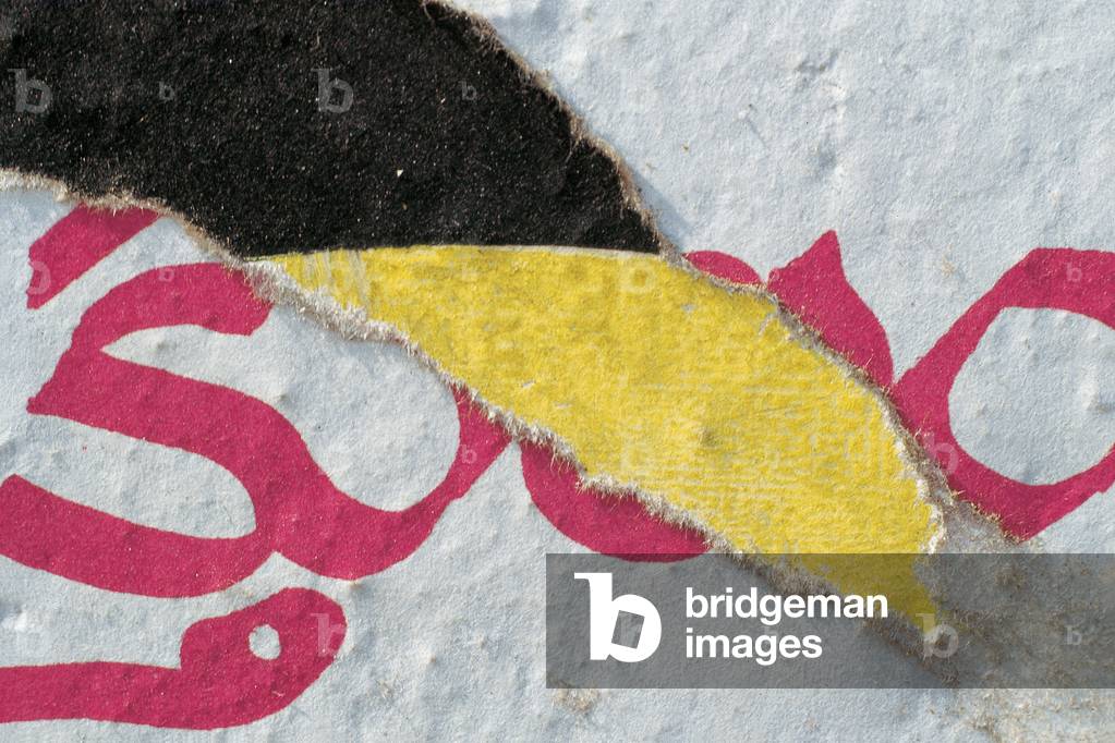 Poster on painted wall (photo)