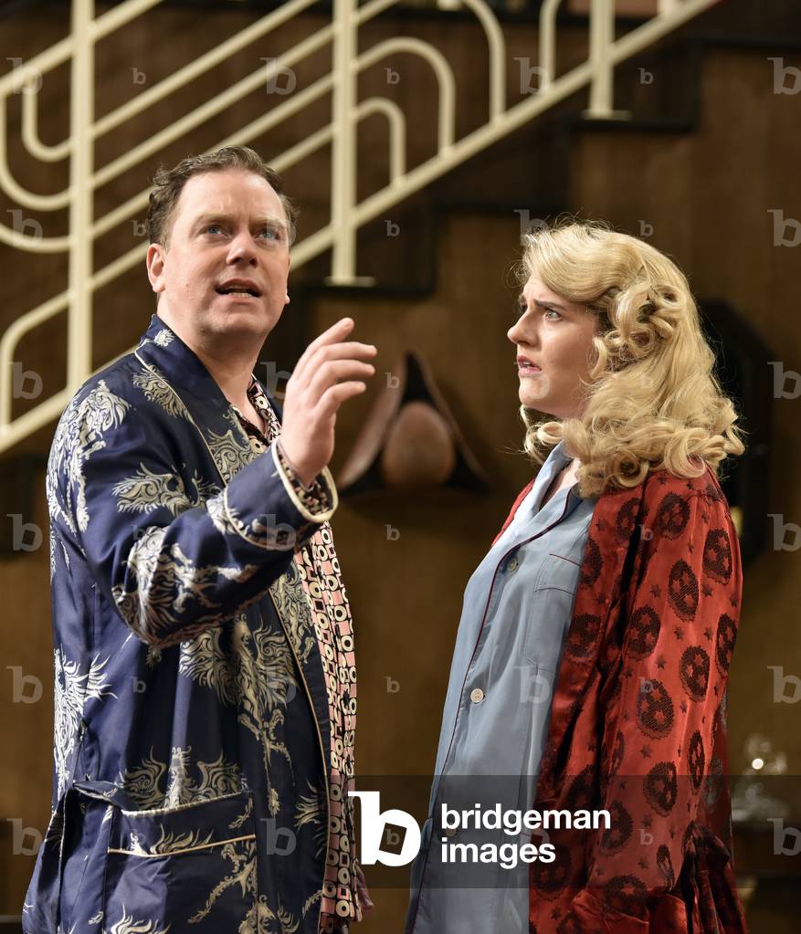Rufus Hound (Playing Garry Essendine) and Lizzy Connolly (Playing Daphne Stillington) in a scene from Present Laughter by Noel Coward, Chichester Festival Theatre, Chichester, Sussex, United Kingdom. Wednesday 25 April 2018.