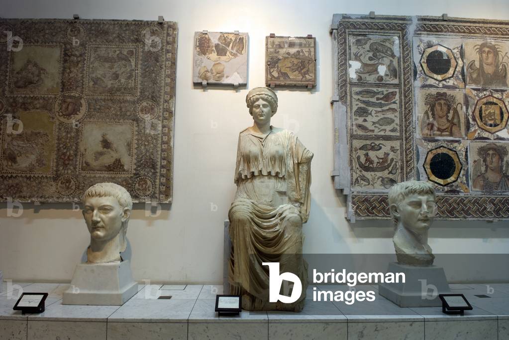 Roman era statues Left to Right: Drusus, Antonia, Germonikos in the Jamahiriya Museum, Green Square (Martyrs' Square), Tripoli, Libya  (photo)