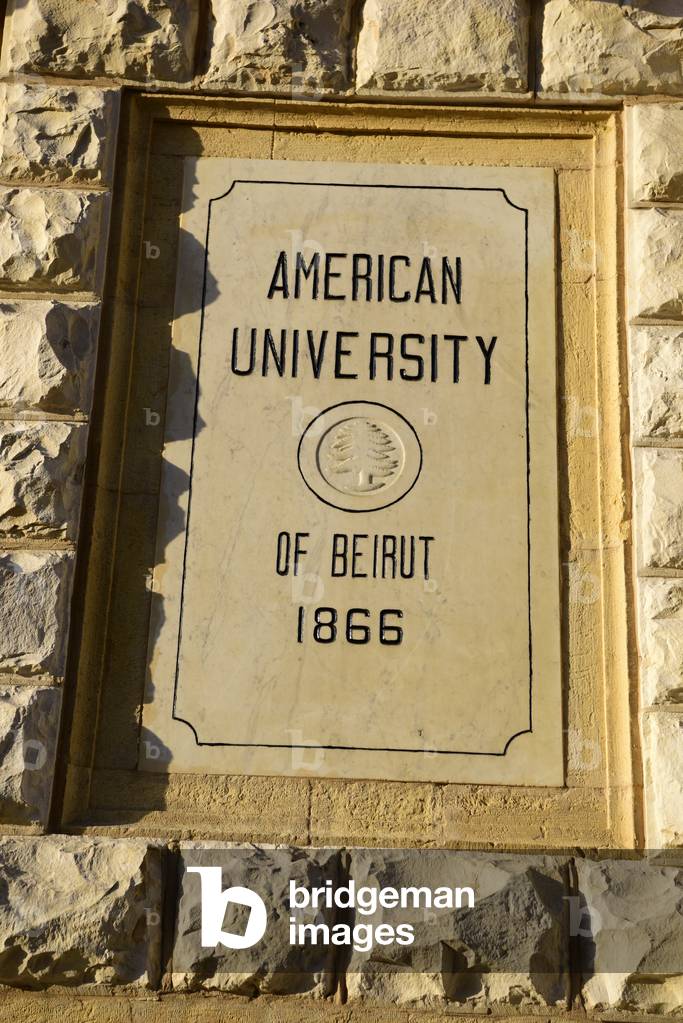 Name plaque on the wall of the American University of Beirut (AUB), Ras Beirut, Lebanon. Founded in 1866 (photo)