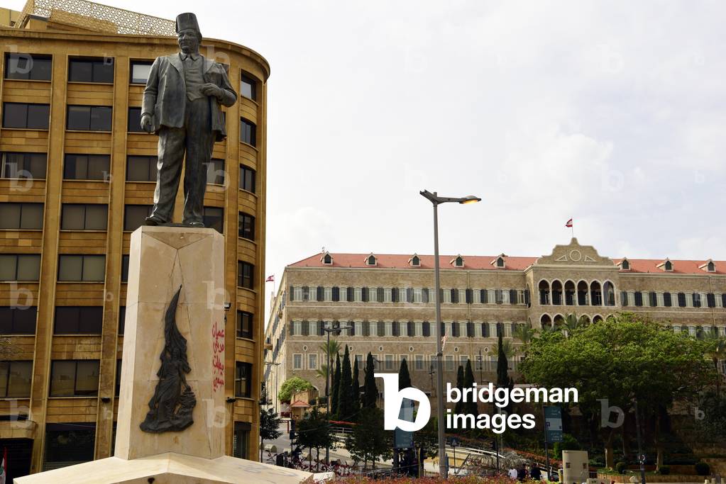 Statue of Riad al-Solh, Lebanon's first post-independence prime minister with the Grand Serail (prime minister's office and Council of Ministers) in background, Downtown, Beirut, Lebanon (photo)