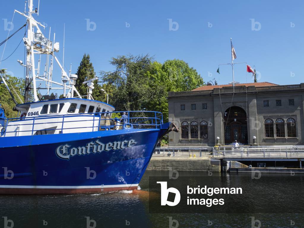 A fishing boat floats in a lock, Ballard Locks, Seattle, Washington, USA, Summer (photo)