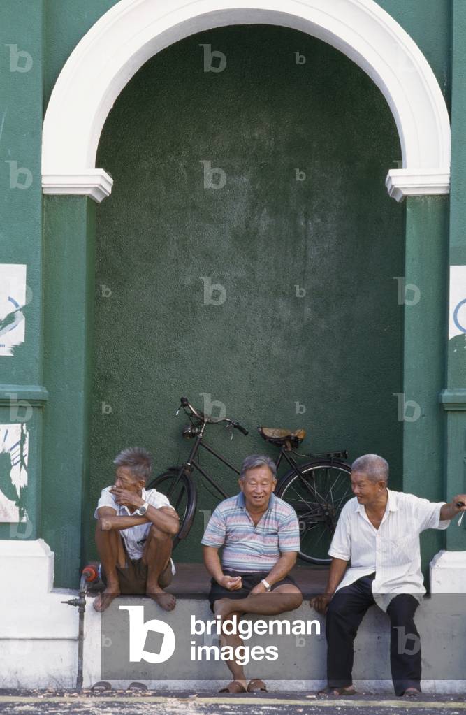 Locals Relaxing W/ Bikes in Archway (photo)