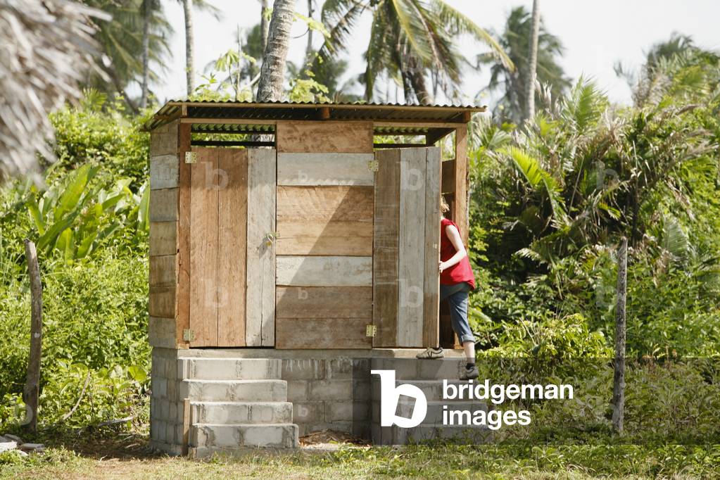 Woman Entering Hut, Tasbapauni, Nicaragua (photo)