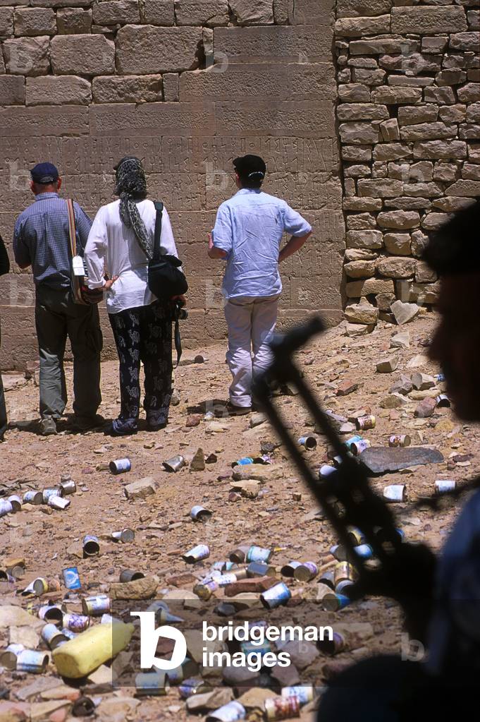 Tourists Being Guarded By the Military at the Walled City of Barakesh Which Is Cover with Rubbish Yemen (photo)