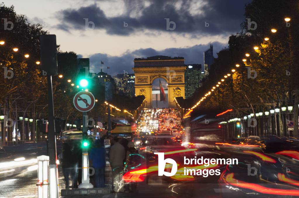 Champs Elysees and Arc de Triomphe decorated for Christmas at dusk, Paris, France (photo)