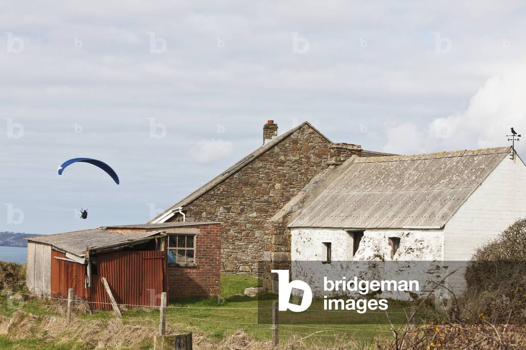 Paragliding Above Newgale Beach and Stone Cottage Barn Along Pembrokeshire Coast Near St David's, Wales, UK  (photo)