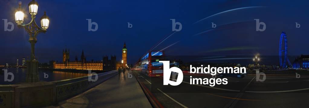 UK, Panoramic view of Westminster Bridge with traffic at night with Houses of Parliament and London eye in background, London (photo)