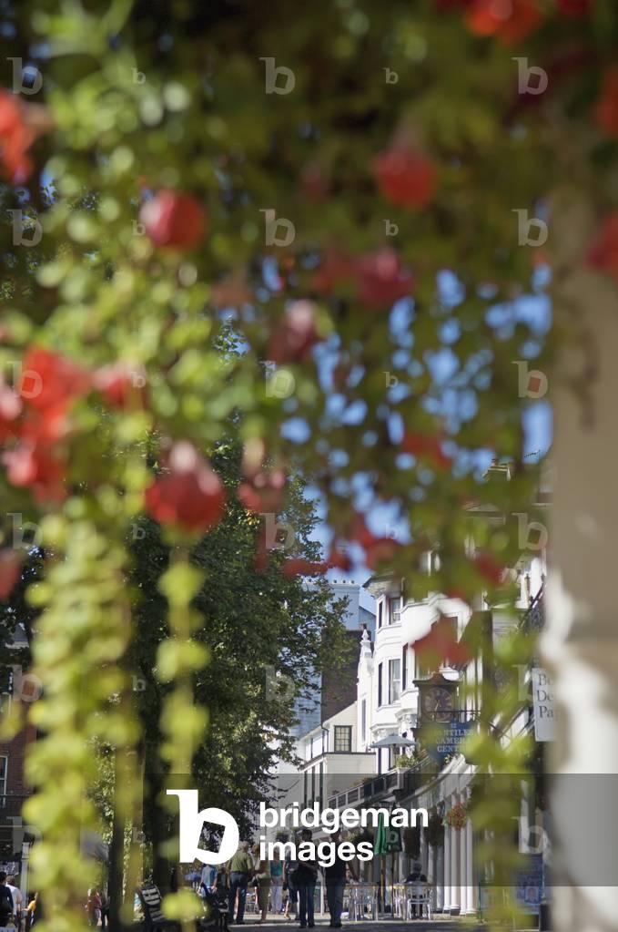 People at Pantiles with Reflection in Window, Tunbridge Wells, Kent, England, UK (photo)