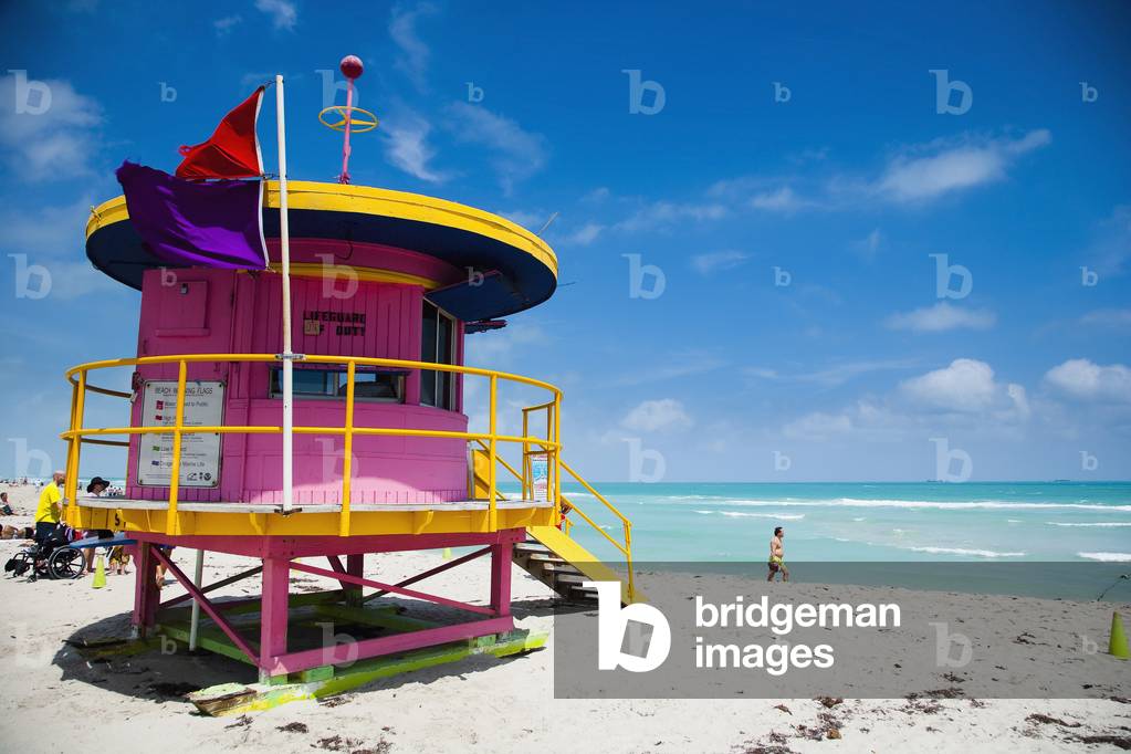 Brightly Colored Pink and Yellow Life Guards Tower, South Beach, Miami, Florida, Usa. (photo)