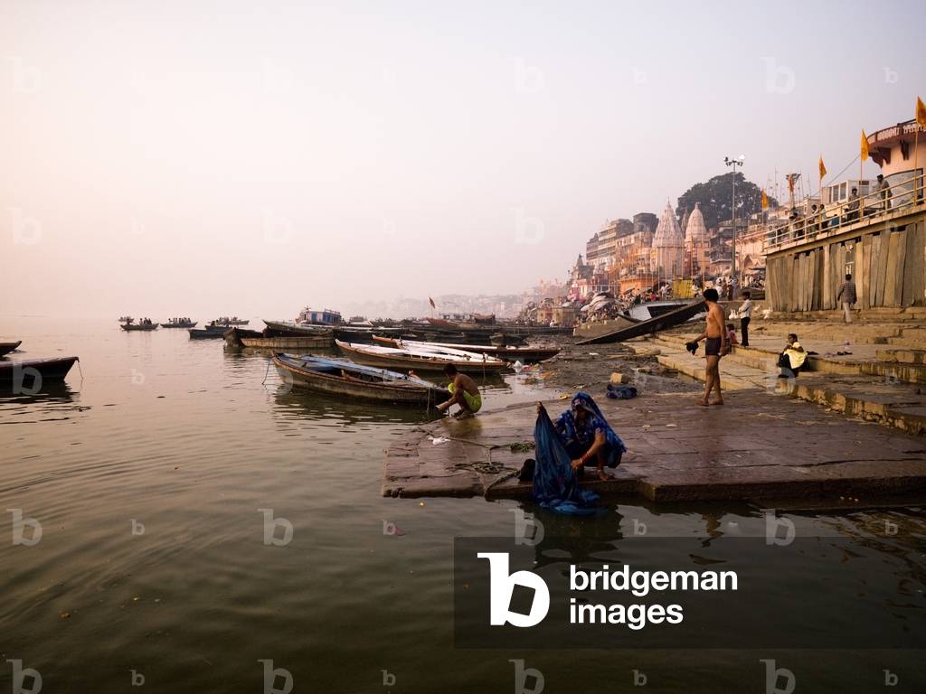 People Washing Their Clothes in the River, Ganges River, Varanasi, India (photo)