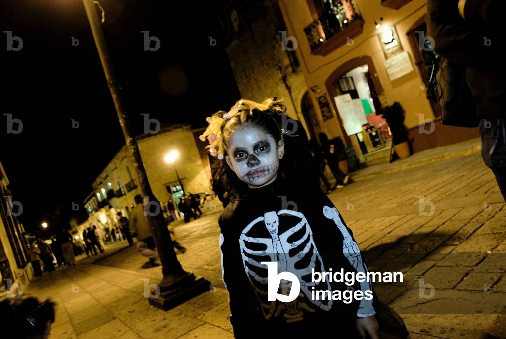 Little Girl Dressed As Skeleton For Mexican Day of the Dead, Mexico (photo)
