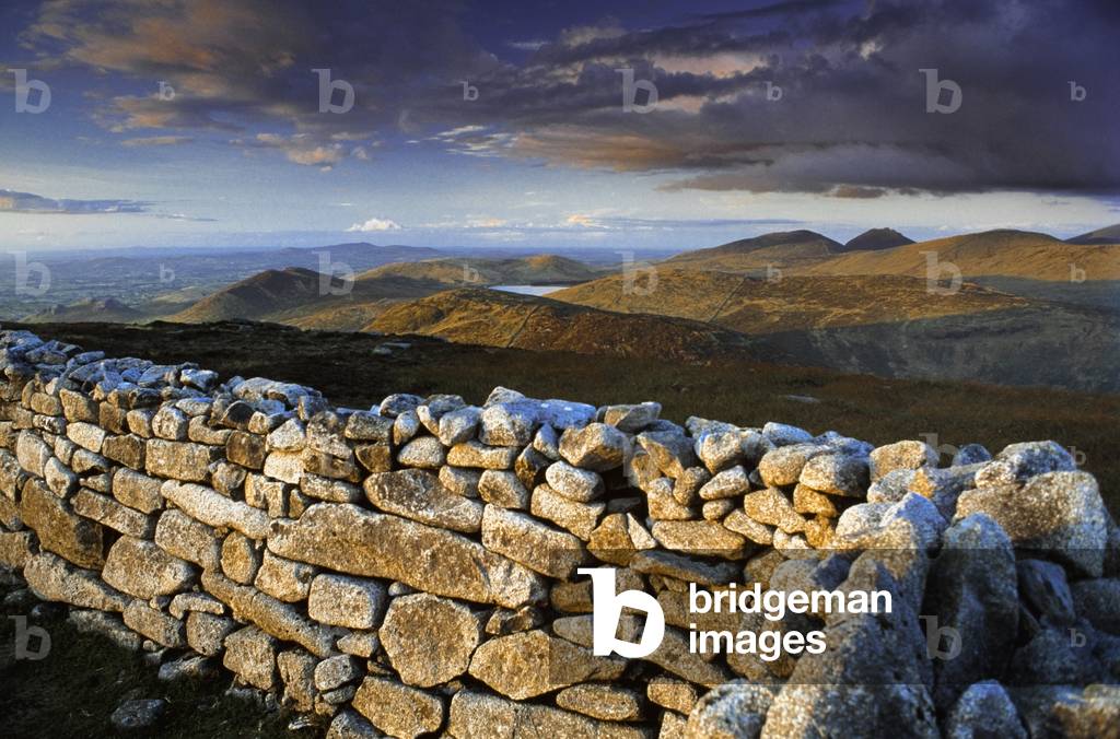 Rustic Stone Wall By Seashore (photo)